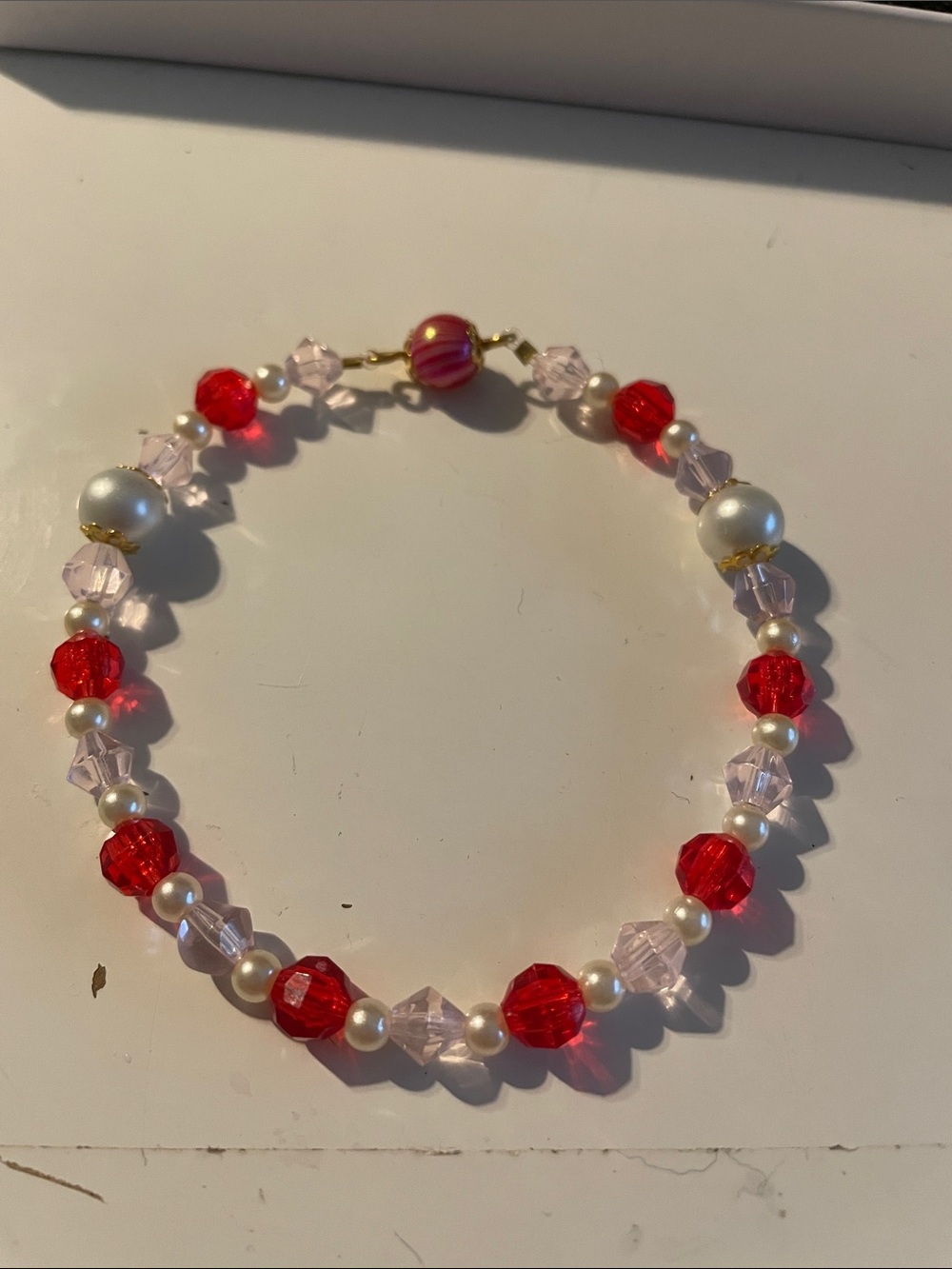 Handcrafted Red and Pink Beaded Bracelet with Faux Pearl Accents